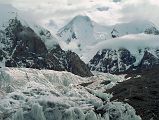 16 Gasherbrum I and Gasherbrum I South From Abruzzi Glacier The next morning we started our trek to Gasherbrum base camp in mostly cloudy weather. After 30 minutes we reached Gasherbrum Corner at the junction of the Upper Baltoro Glacier with the tributary Abruzzi Glacier. Gasherbrum I and Gasherbrum I South lie straight ahead. Gasherbrum I (8080m) is the 11th highest mountain in the world. Gasherbrum I was first climbed by July 5, 1958 by Americans Pete Schoening and Andy Kauffman.